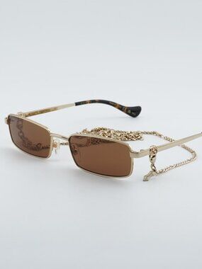 Gucci GG1600S 002 Women Sunglasses Gold Rectangle Frame, Brown Lenses
